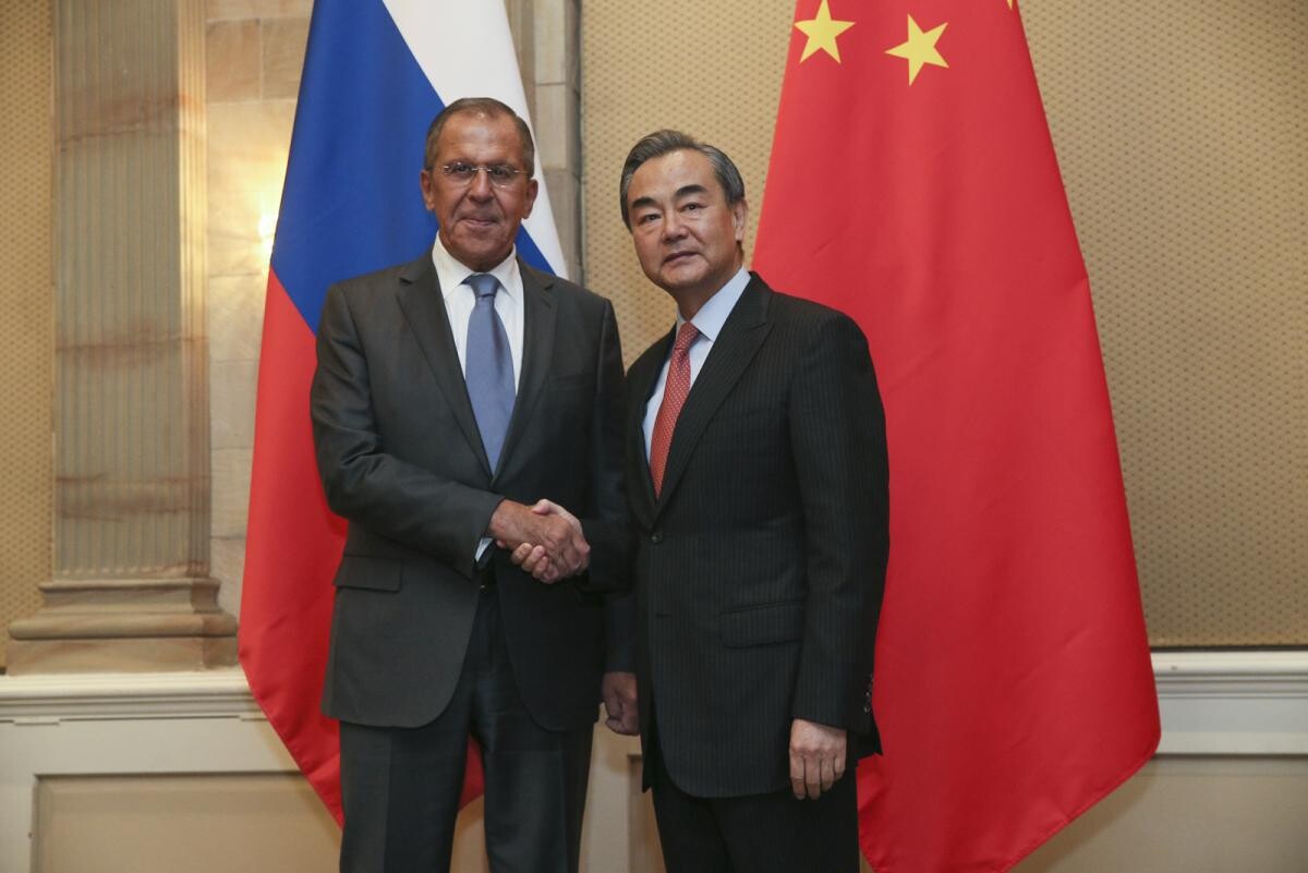 Serghei Lavrov și Wang Yi 